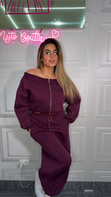 Tuta con scollo a barca