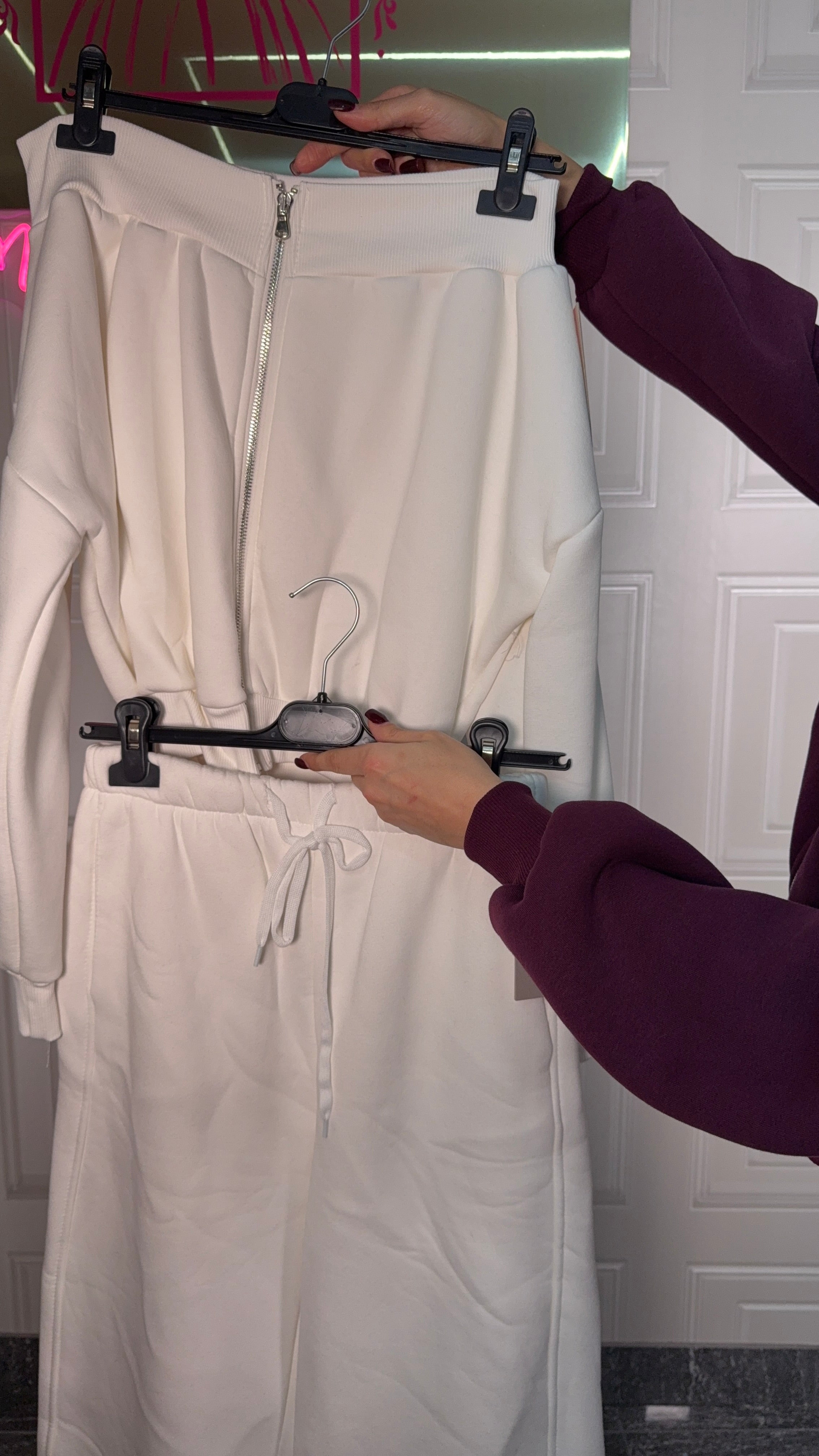 Tuta con scollo a barca