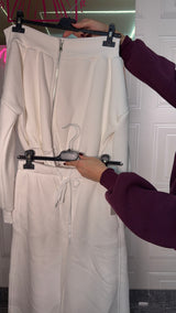 Tuta con scollo a barca