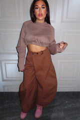 Pantalone ballon JustWest con abbottonatura trasversale crockie