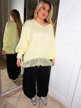 Maglione pastello con raso