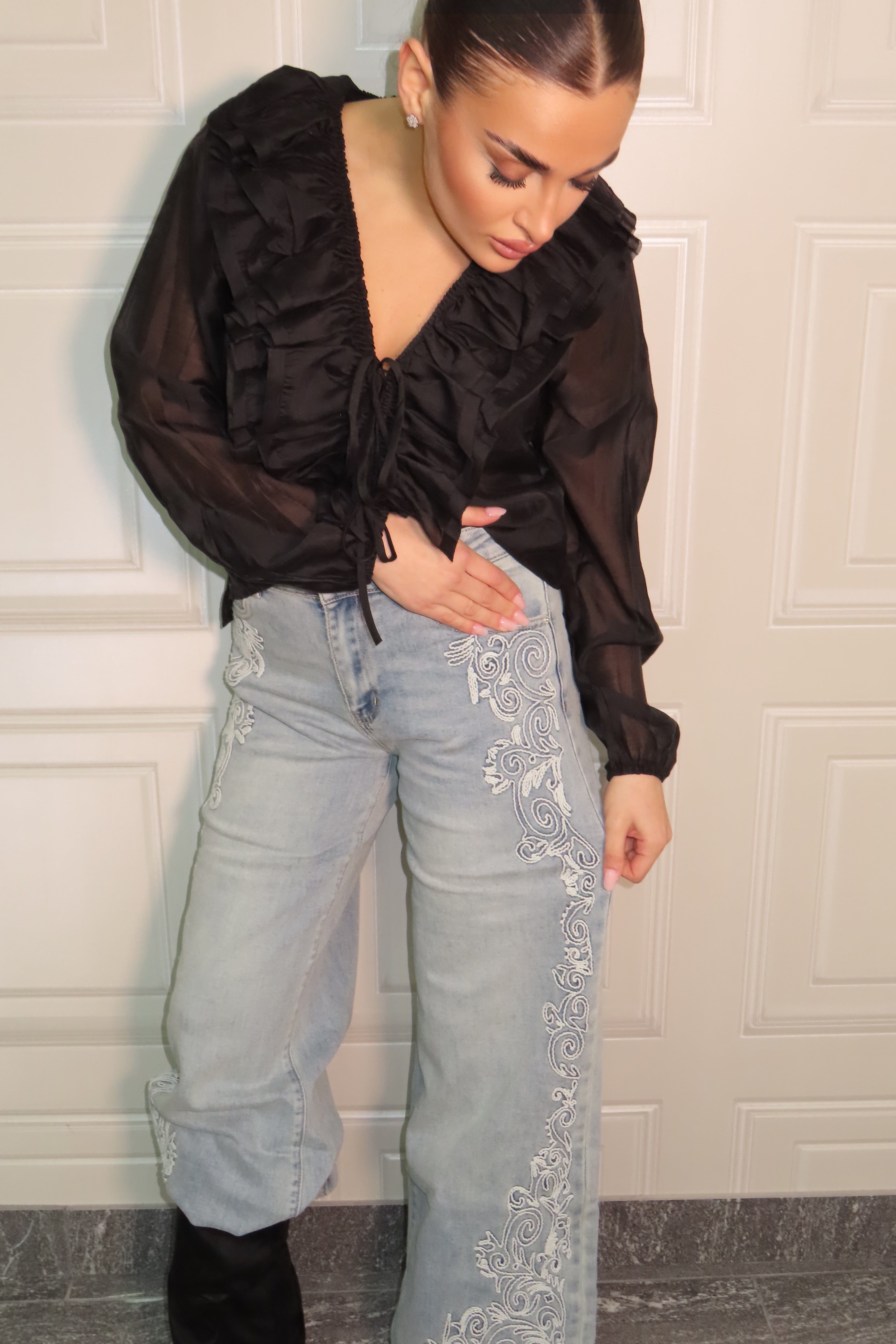 Jeans chiaro con origami