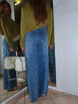 Jeans con borchie sferiche