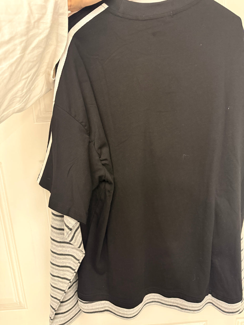 Maglia con maniche a righe