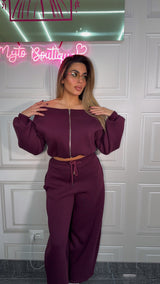 Tuta con scollo a barca