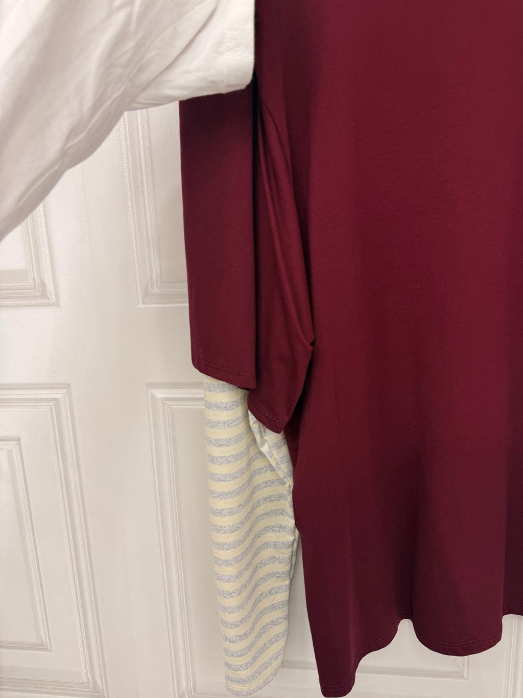 Maglia con maniche a righe