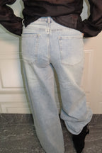 Jeans chiaro con origami