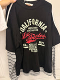 Maglia con maniche a righe