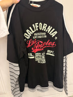 Maglia con maniche a righe