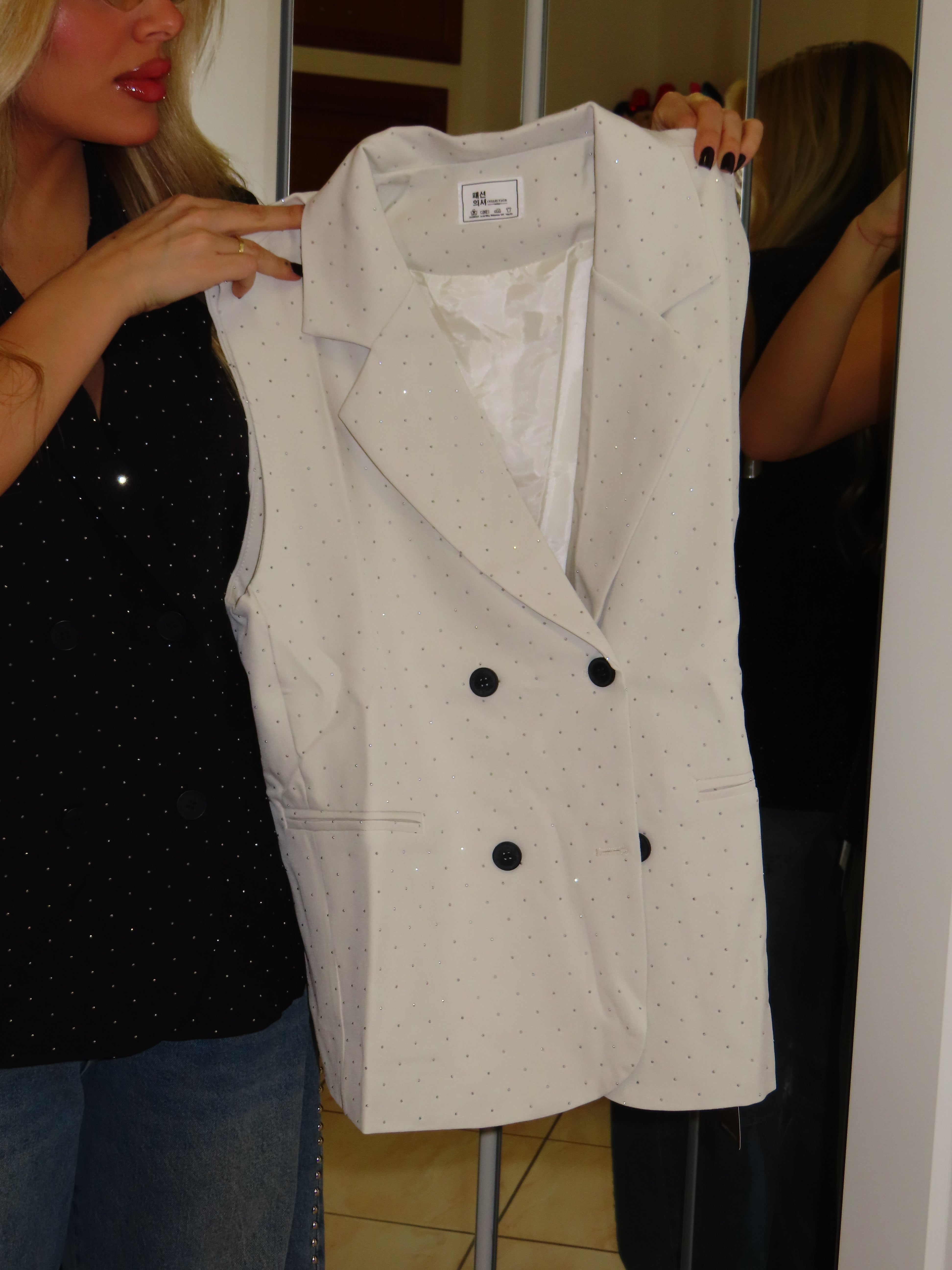 Gilet con brillantini