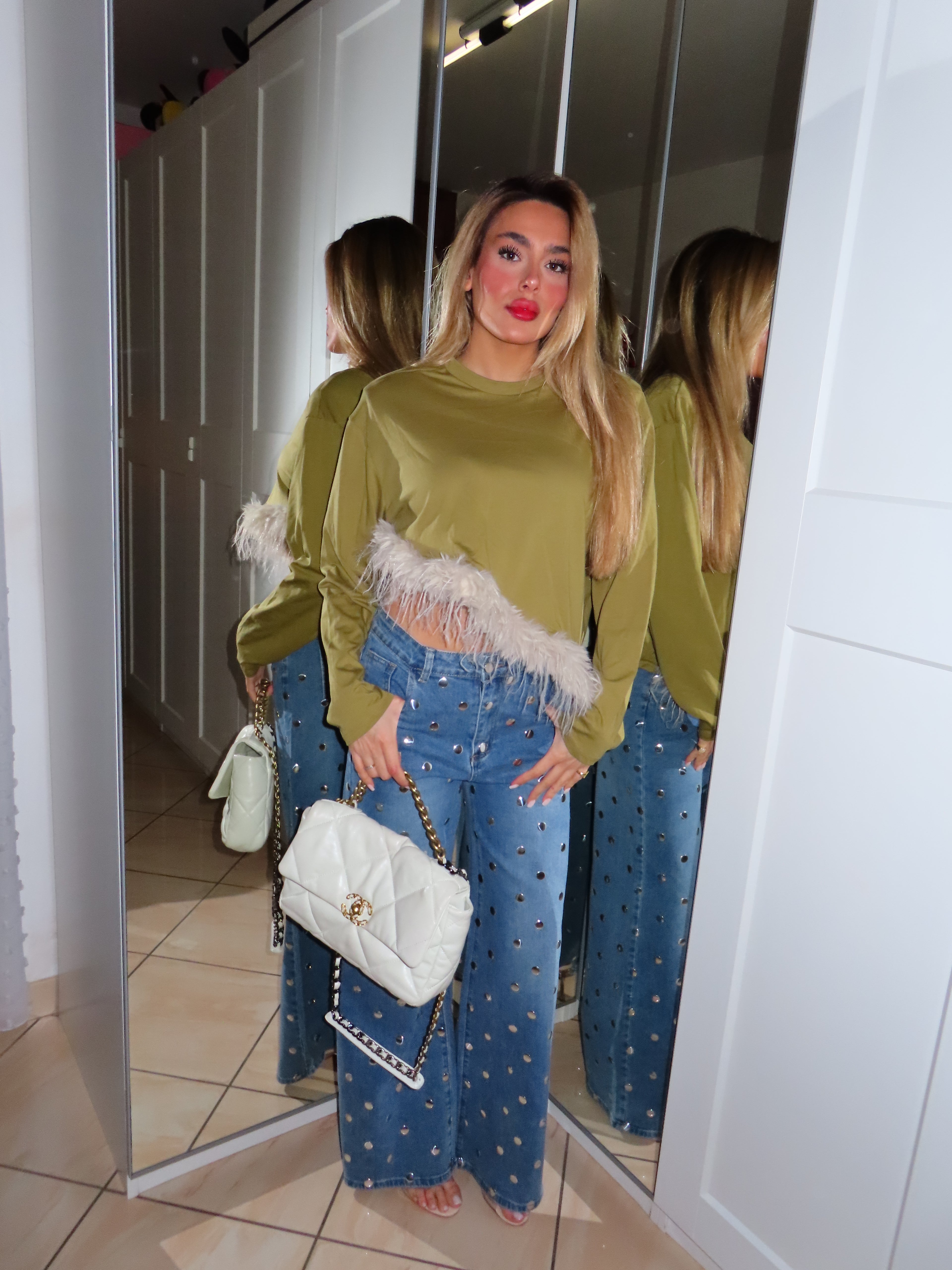 Maglia con piume e spalline