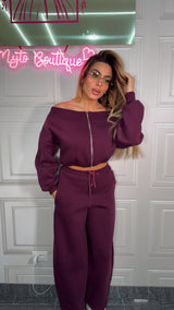 Tuta con scollo a barca