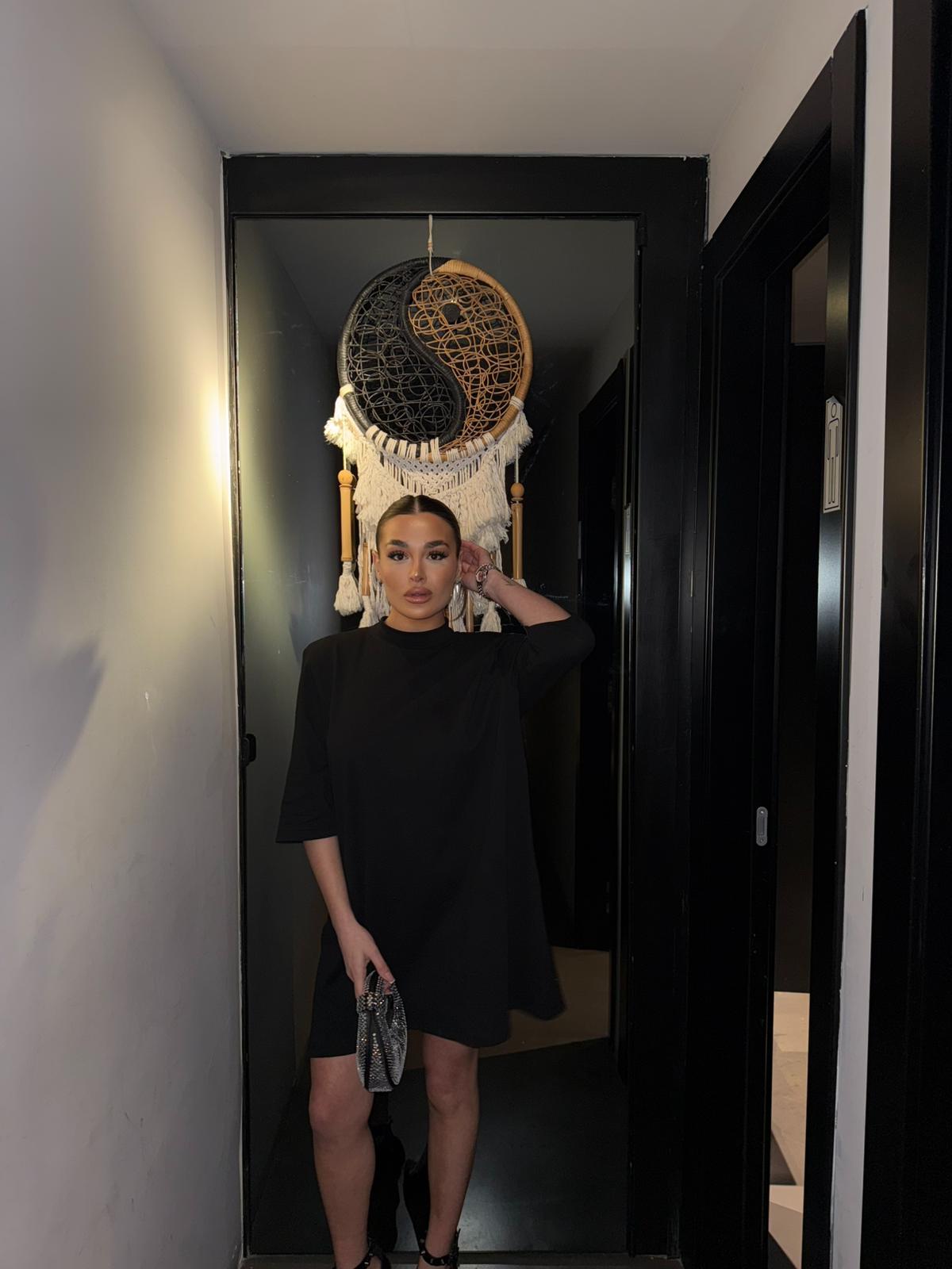 Maglia Crystal con cuore sul retro e manica con strass