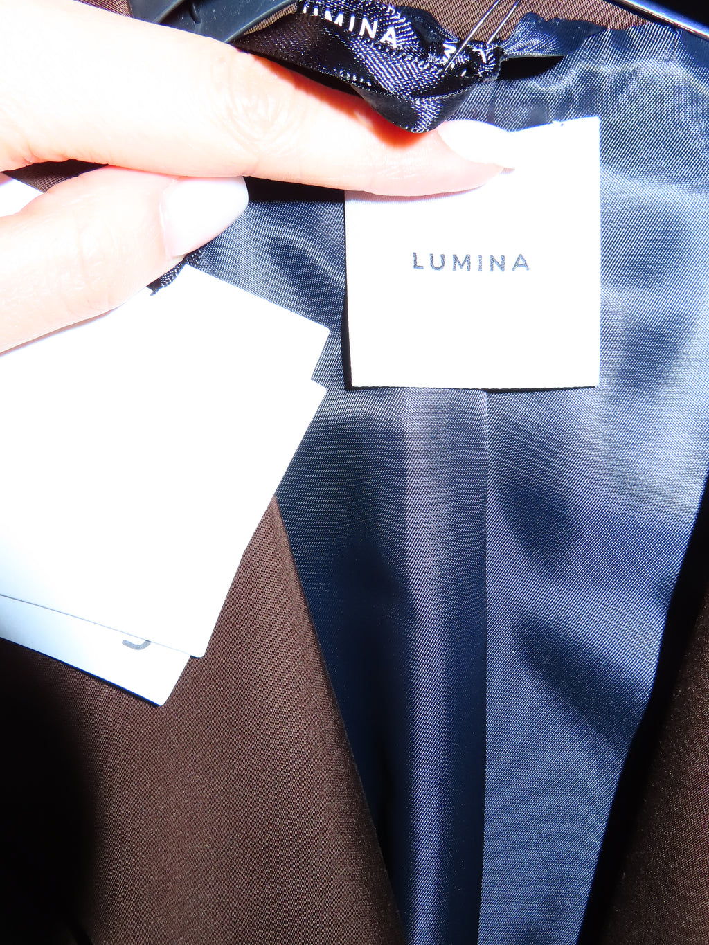 Giacca con spalline imbottite Lumi