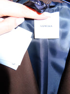 Giacca con spalline imbottite Lumi