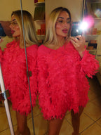 Maglione fucsia con trama particolare