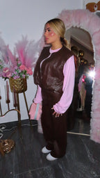 Completo in ecopelle con gilet